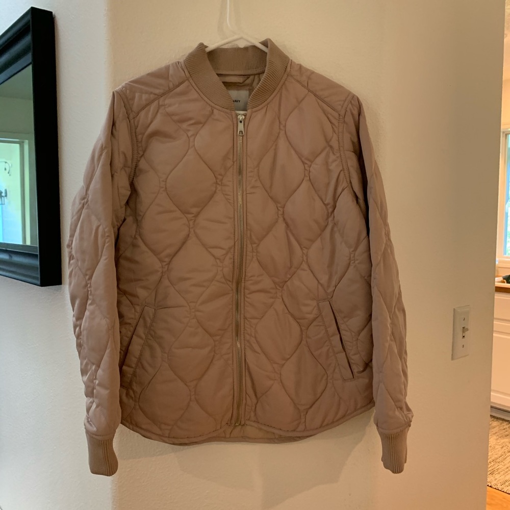Woman’s pink bomber jacket